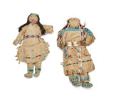 TWO SIOUX BEADED HIDE DOLLS<br