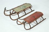 TWO SLEDS. Both paint decorate