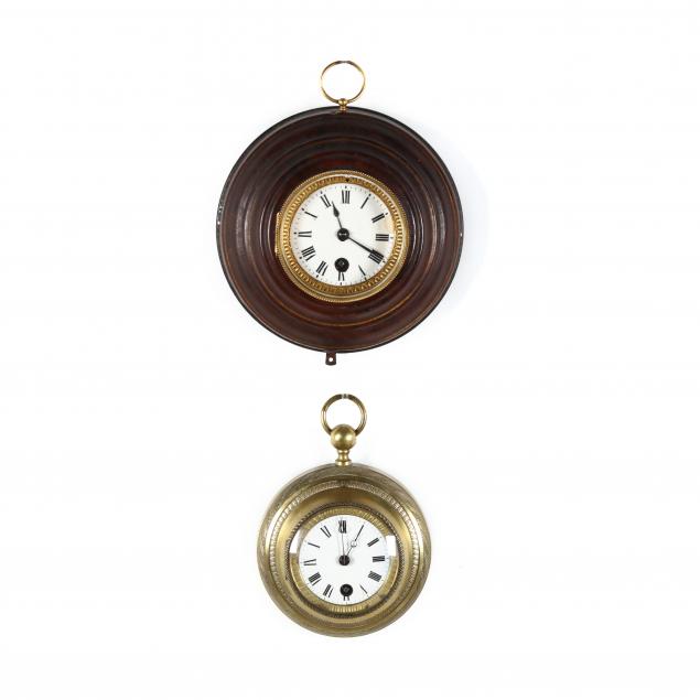 TWO SMALL ROUND WALL CLOCKS Circa
