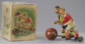 TWO SOCCER PLAYERS WITH BALLS