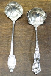 TWO SOLID SILVER SOUP LADLES,