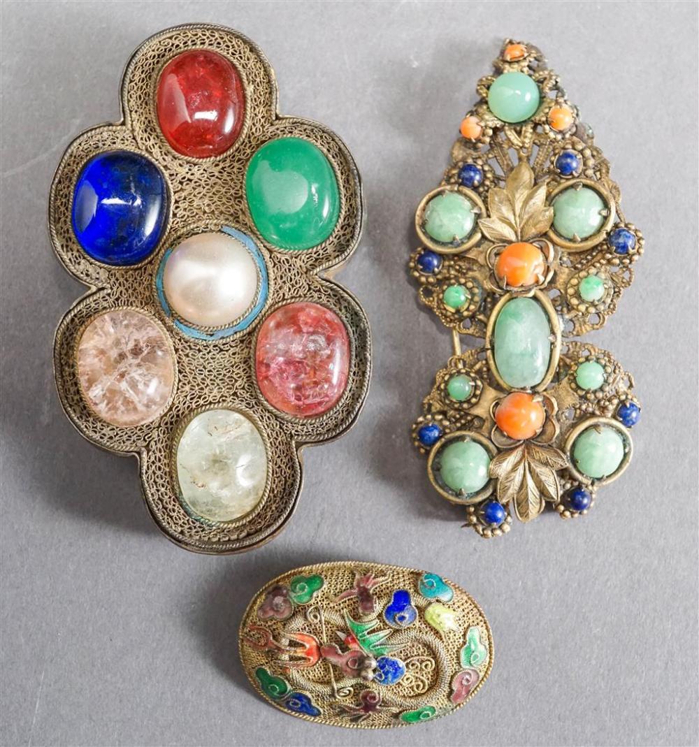 TWO SOUTHEAST ASIAN JEWELED PINS