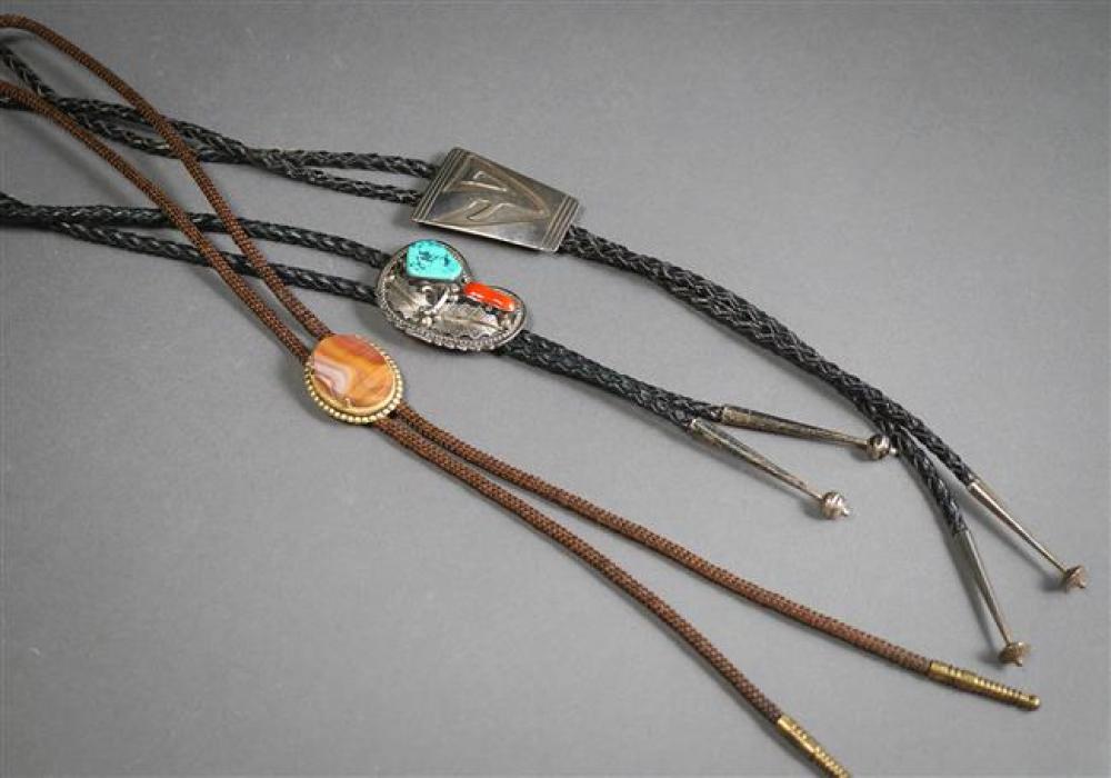 TWO SOUTHWEST SILVER BOLAS AND A