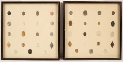 Two square glazed frames, each