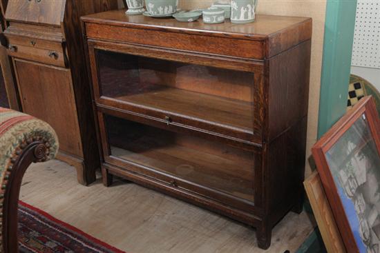 TWO STACK BOOKCASE. Oak and of