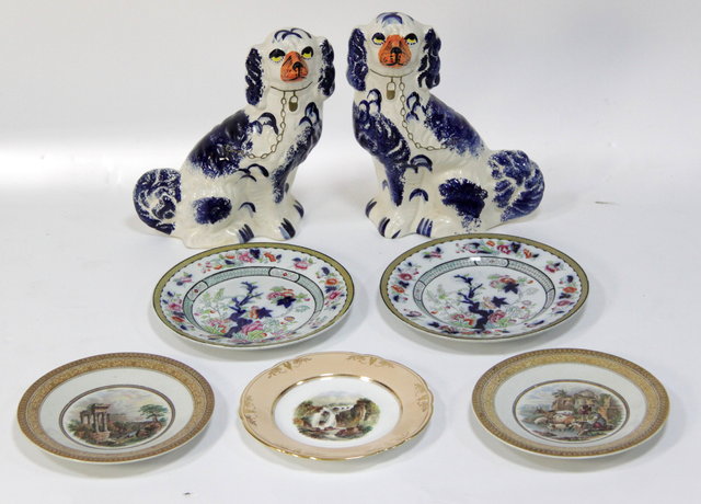 Two Staffordshire dogs two