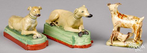 TWO STAFFORDSHIRE RECUMBENT