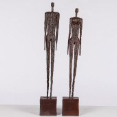 TWO STANDING METAL FIGURES, UN