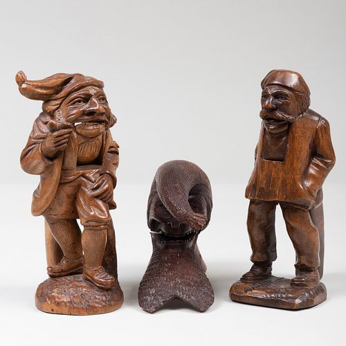 TWO STANDING WOOD NUTCRACKERS OF