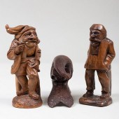 TWO STANDING WOOD NUTCRACKERS