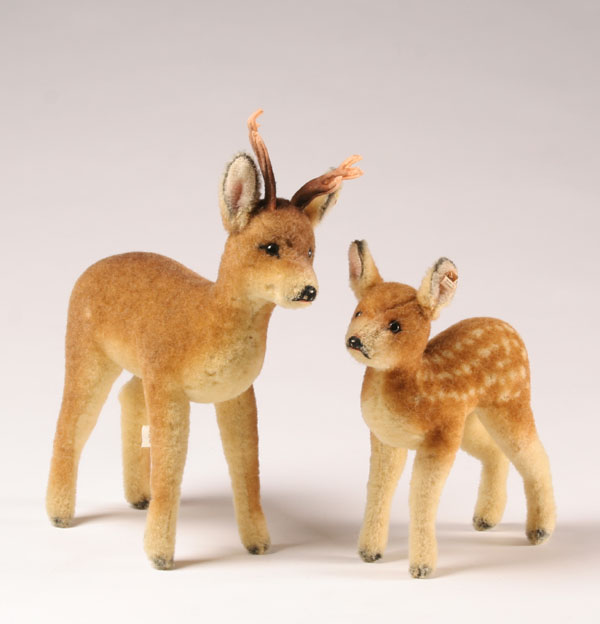 Two Steiff deer both with ear