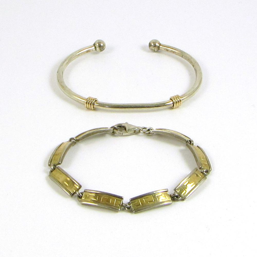 TWO STERLING SILVER AND YELLOW GOLD