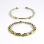 TWO STERLING SILVER AND YELLOW