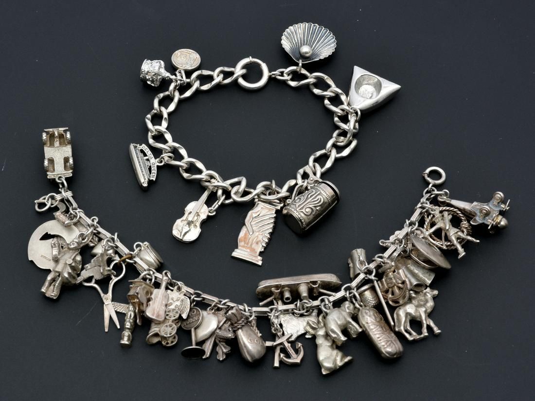 TWO STERLING SILVER CHARM