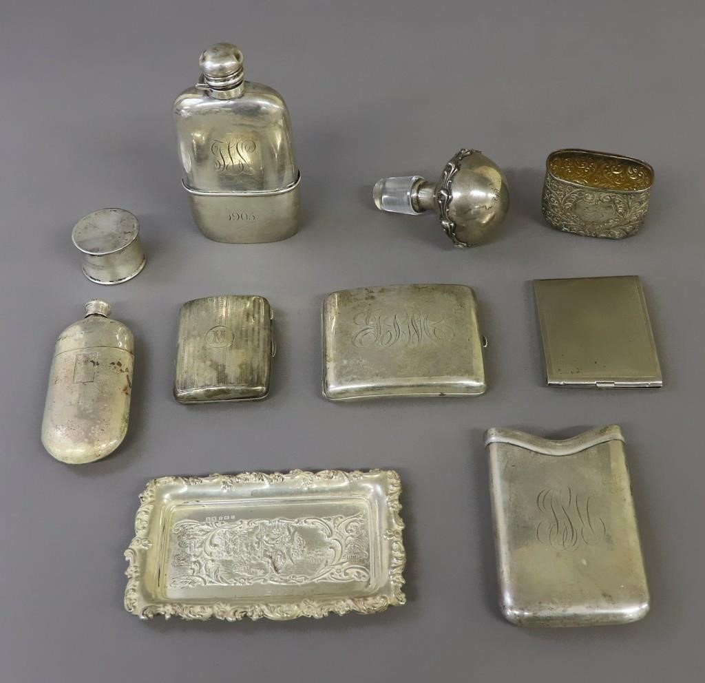 Two sterling silver flasks, largest