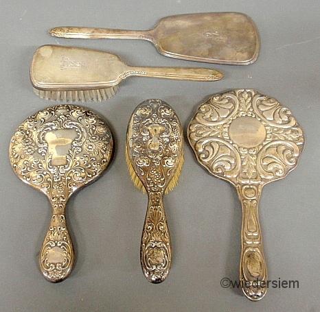 Two sterling silver hand-mirror and