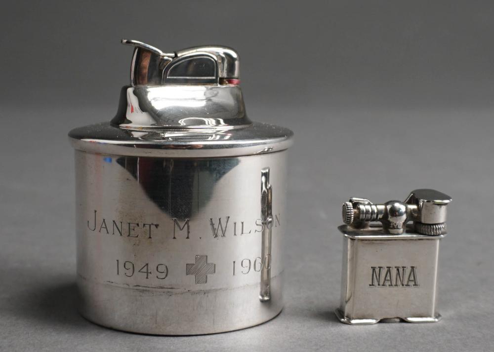 TWO STERLING SILVER HOUSED TABLE