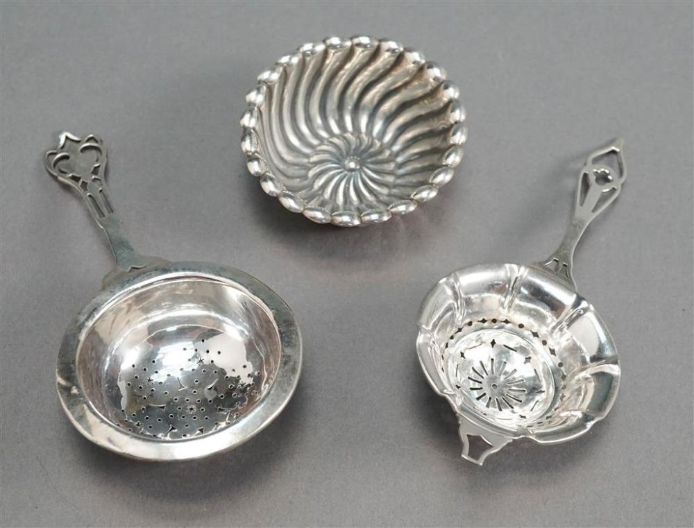 TWO STERLING SILVER TEA STRAINERS