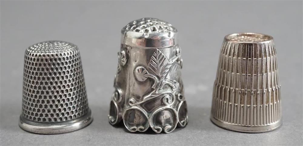 TWO STERLING SILVER THIMBLES AND