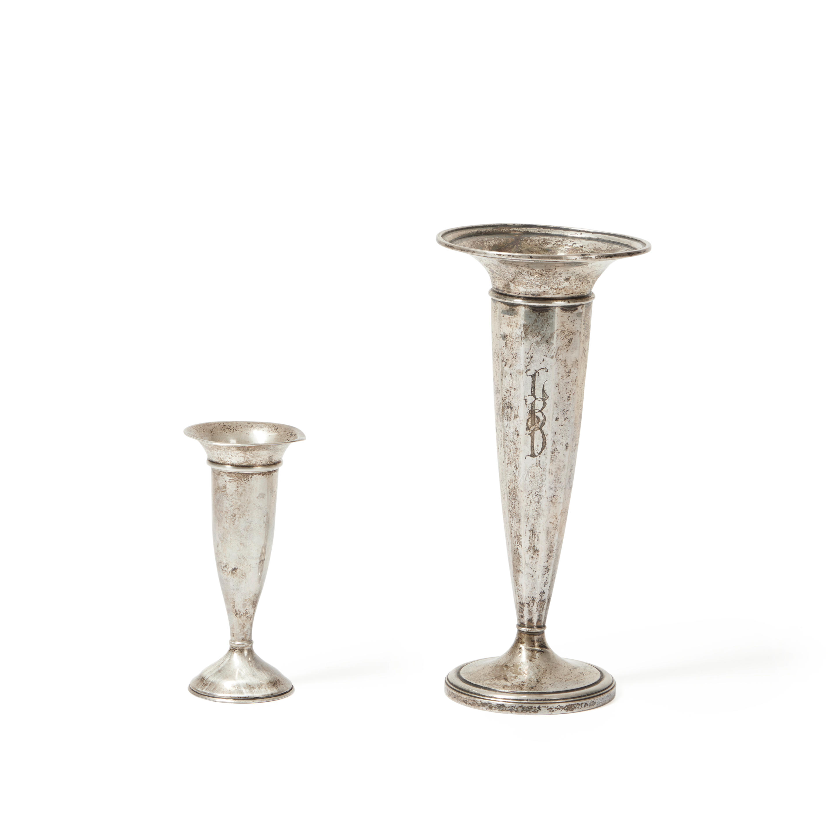 TWO STERLING SILVER WEIGHTED