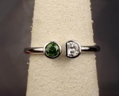TWO-STONE GREEN AND WHITE DIAM