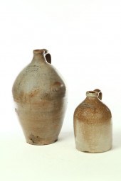 TWO STONEWARE JUGS.  American