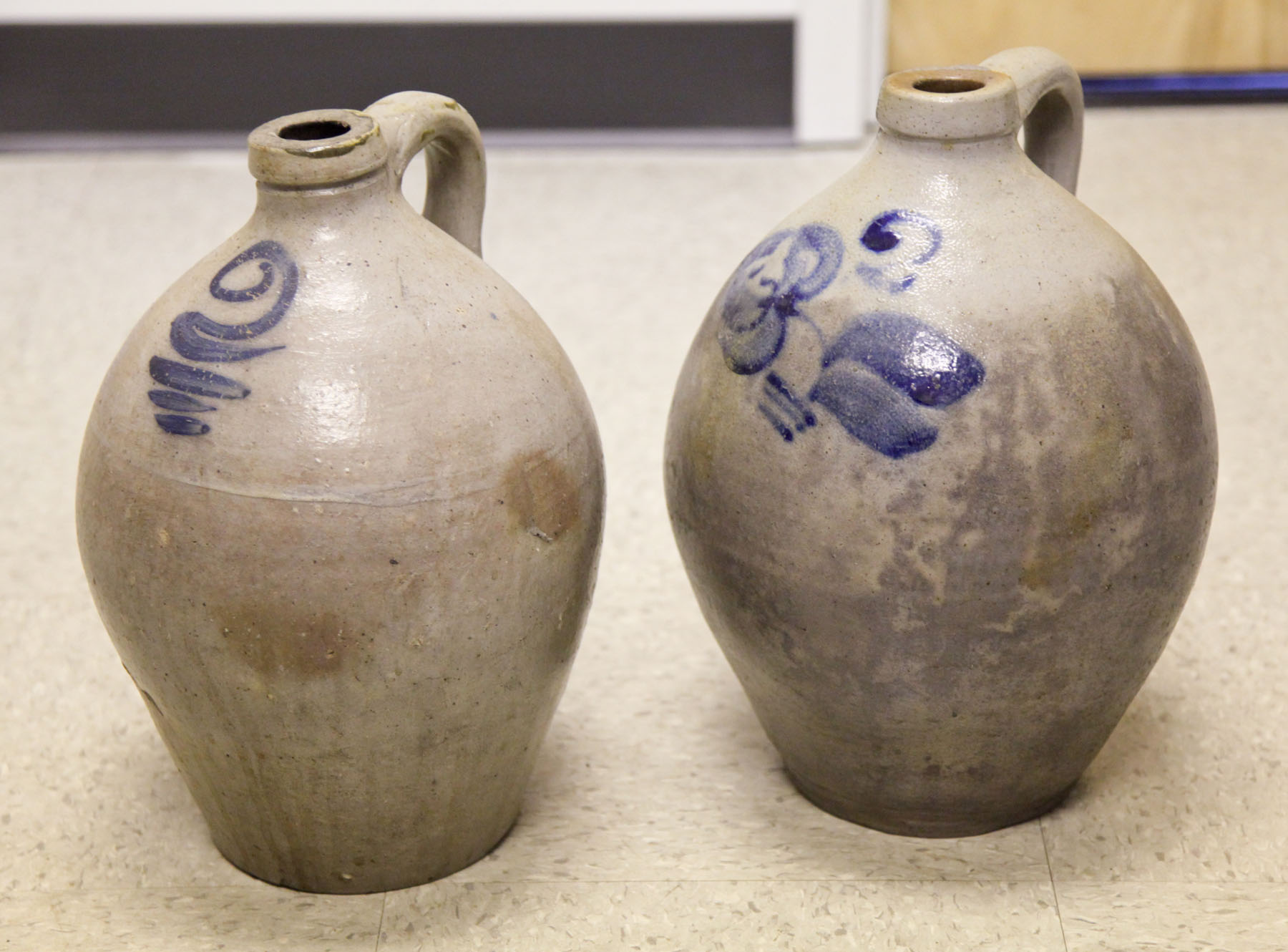 TWO STONEWARE JUGS.  American  19th