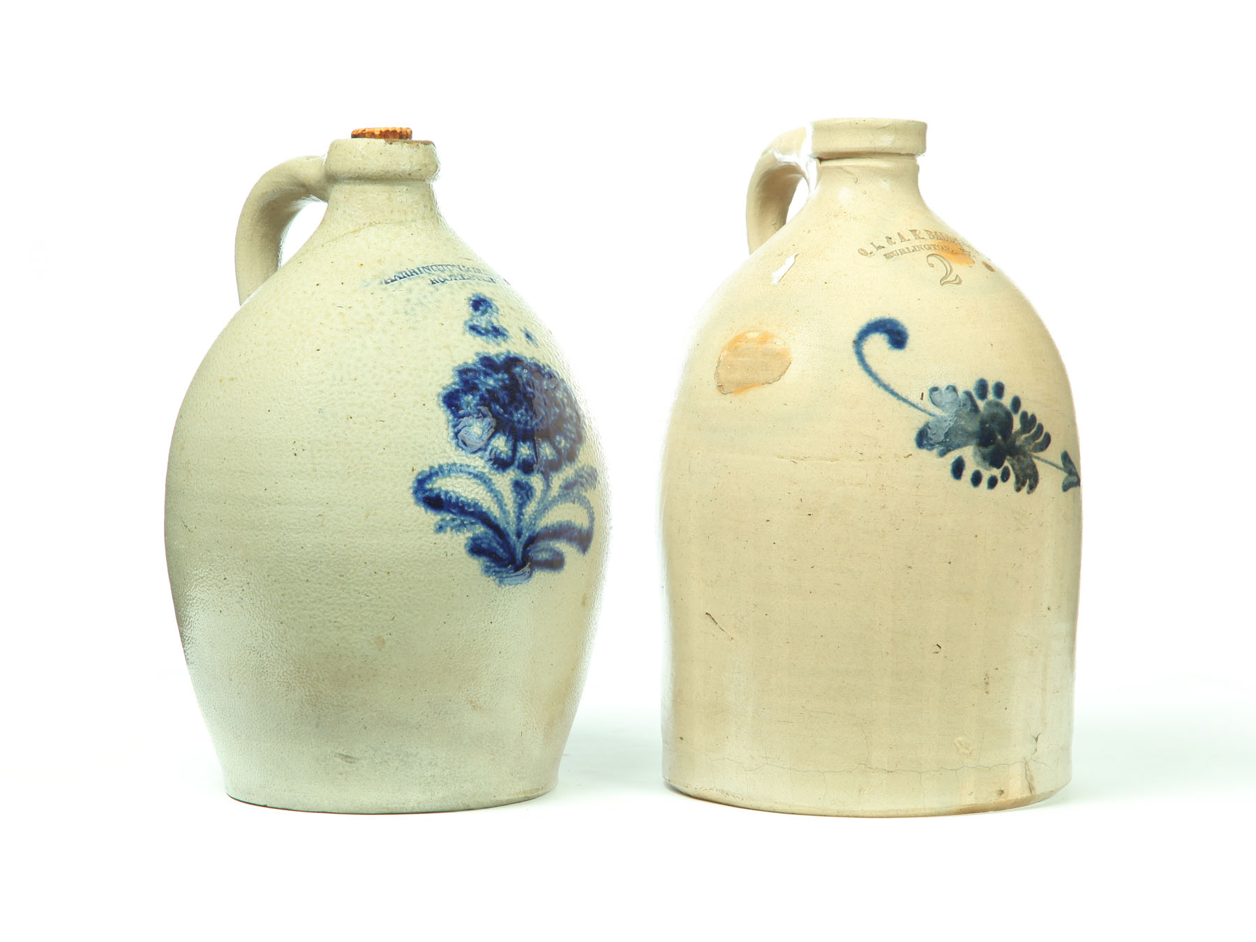 TWO STONEWARE JUGS.  American 