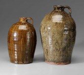 Two Stoneware Jugs one with ro