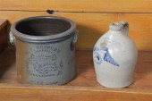 TWO STONEWARE PIECES. A handle