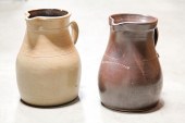 TWO STONEWARE PITCHERS.  Ameri