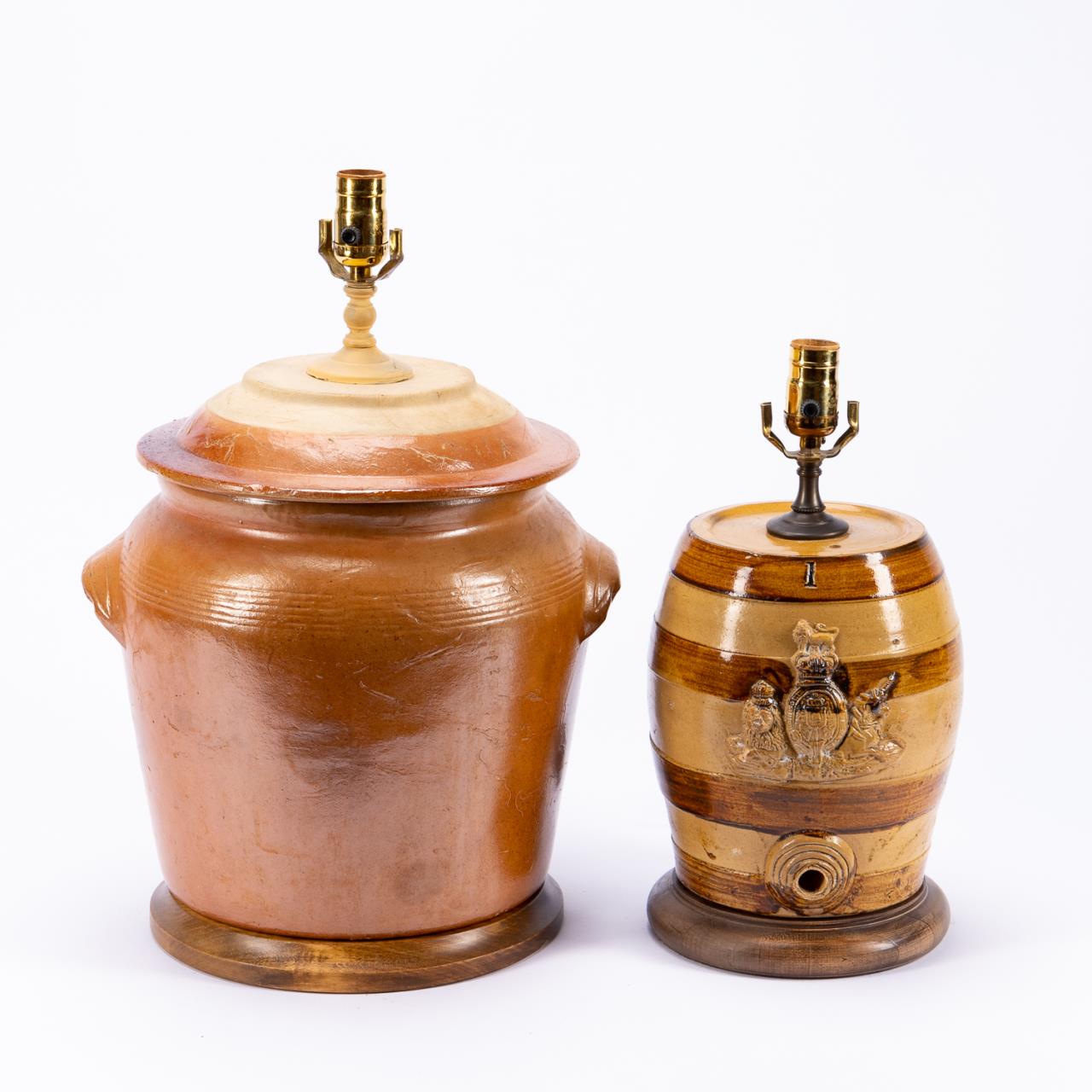TWO STONEWARE VESSELS MOUNTED AS