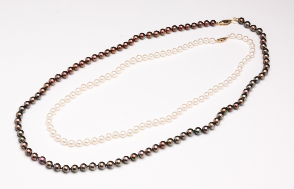 TWO STRANDS OF PEARLS. Twenty first
