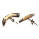 TWO SUBSTANTIAL ANTIQUE CORKSC
