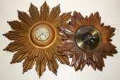 TWO SUNBURST WALL CLOCKS Seth