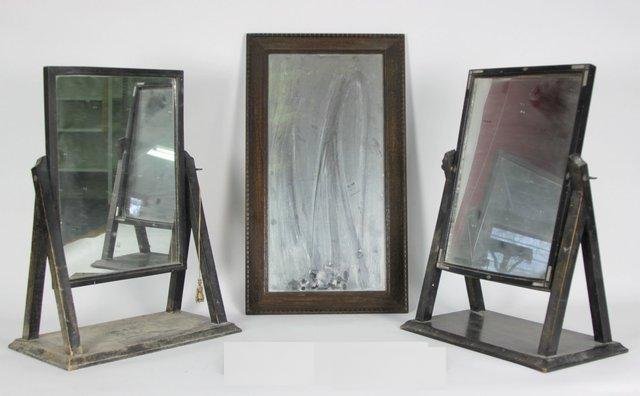 Two swing frame mirrors and a