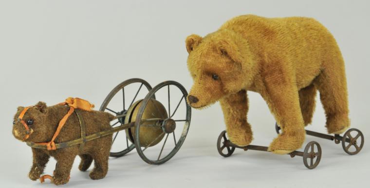 TWO TEDDY BEARS ON WHEELS c.