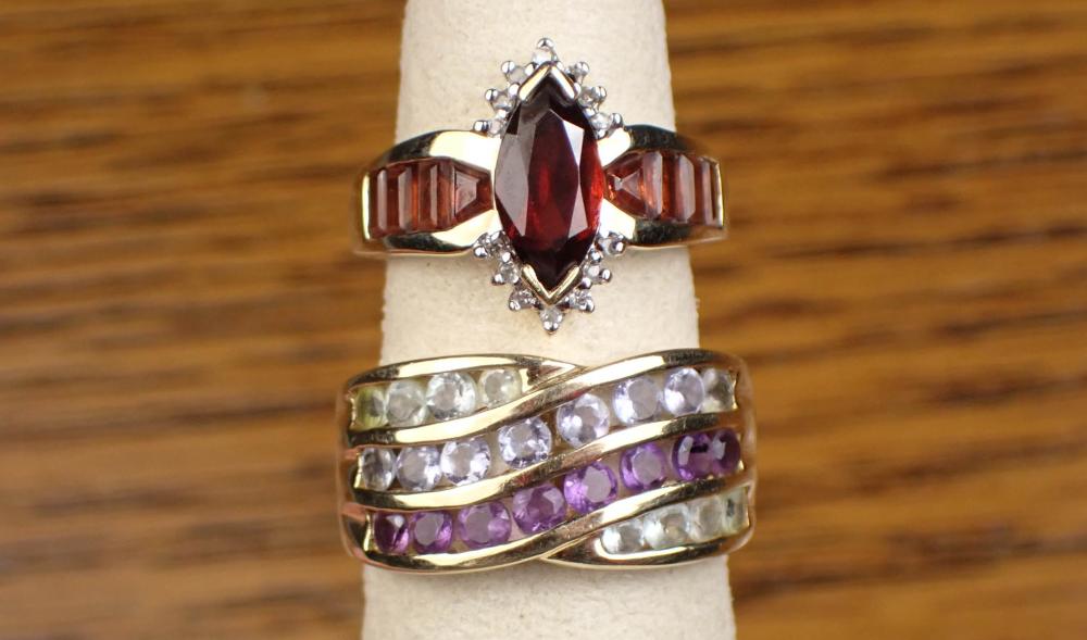 TWO TEN KARAT GOLD AND GEMSTONE