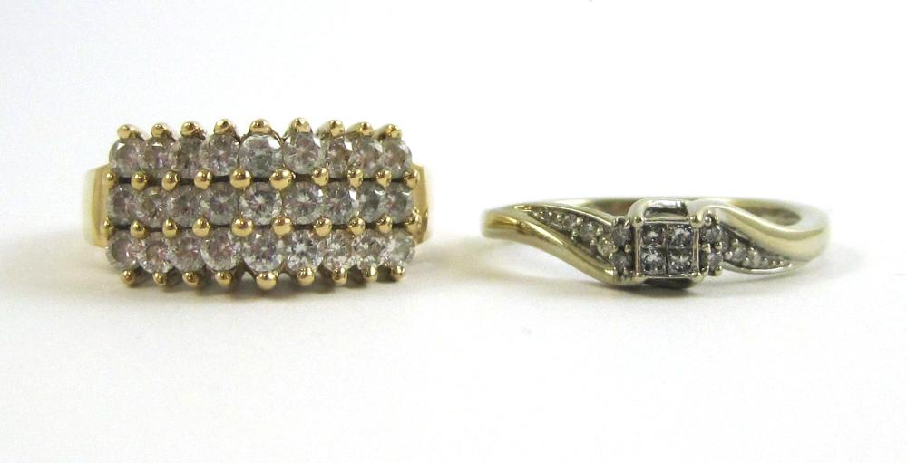 TWO TEN KARAT GOLD RINGS, INCLUDING