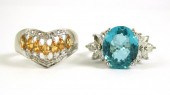 TWO TEN KARAT WHITE GOLD RINGS
