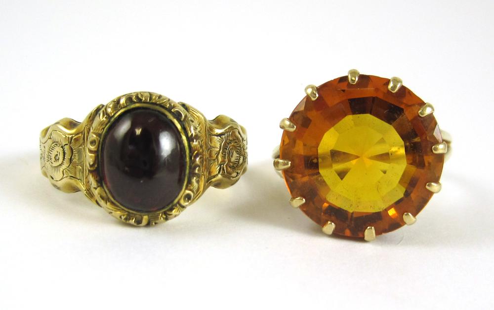 TWO TEN KARAT YELLOW GOLD RINGS,