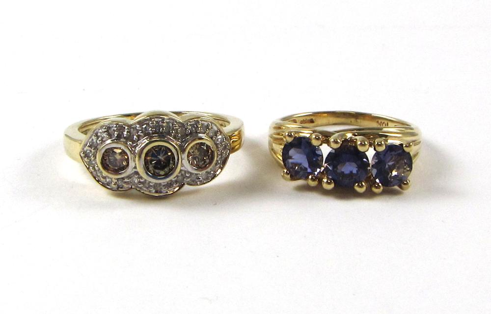 TWO TEN KARAT YELLOW GOLD RINGS,