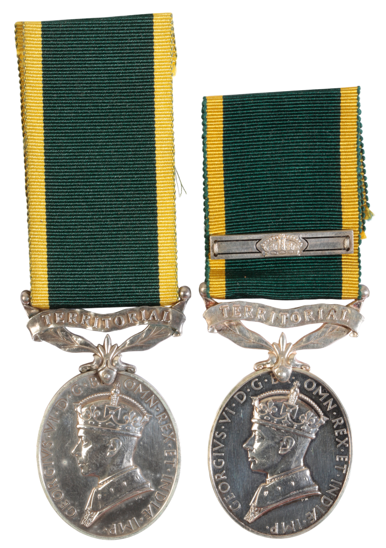 TWO TERRITORIAL MEDALS TO MEMBERS