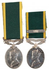 TWO TERRITORIAL MEDALS TO MEMB