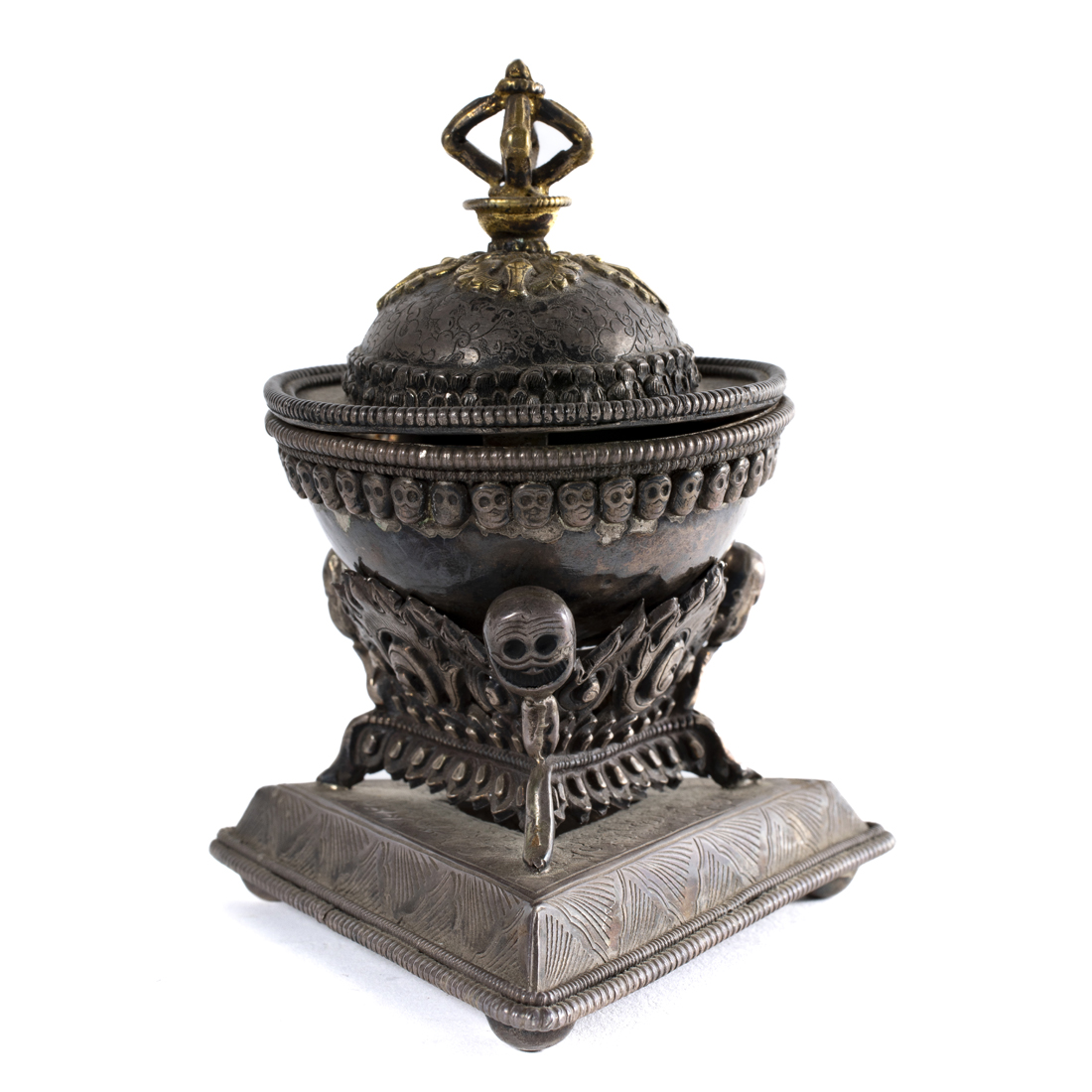 TWO TIBETAN SILVER SKULL CUPS AND
