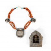 TWO TIBETAN WHITE METAL AMULET
