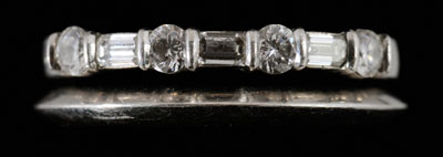 Two Tiffany rings: one set with