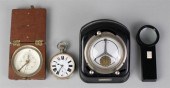TWO TIME PIECES, A COMPASS, AN