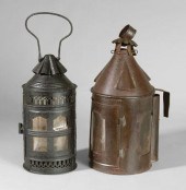 Two tin lanterns: one with tap