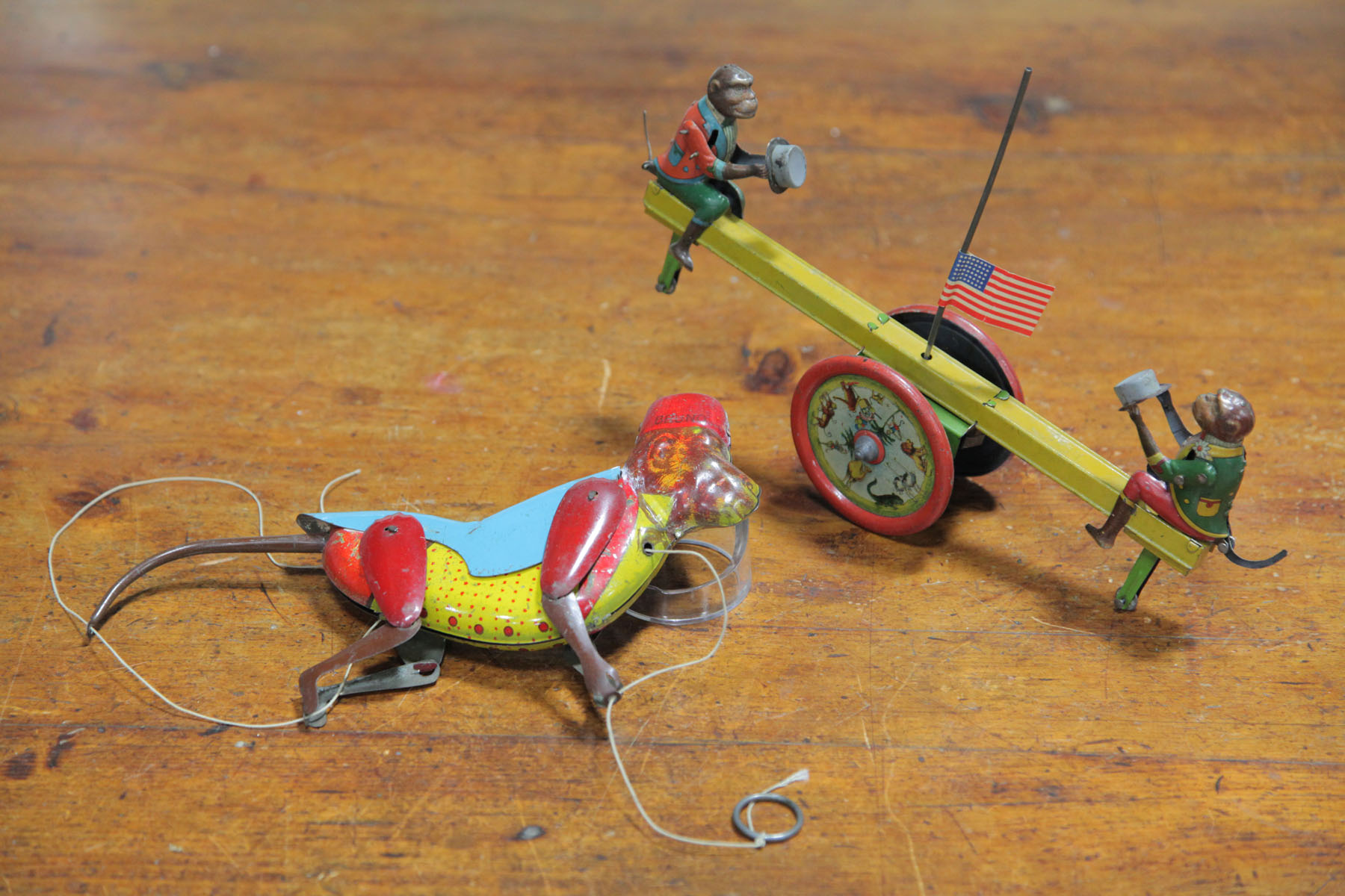 TWO TIN MONKEY TOYS.  American